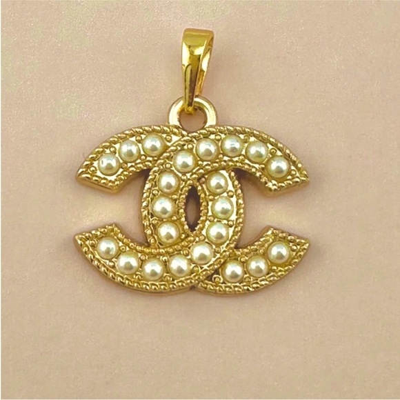 CHANEL Gold and Pearl Logo Necklace - Picture 1 of 4